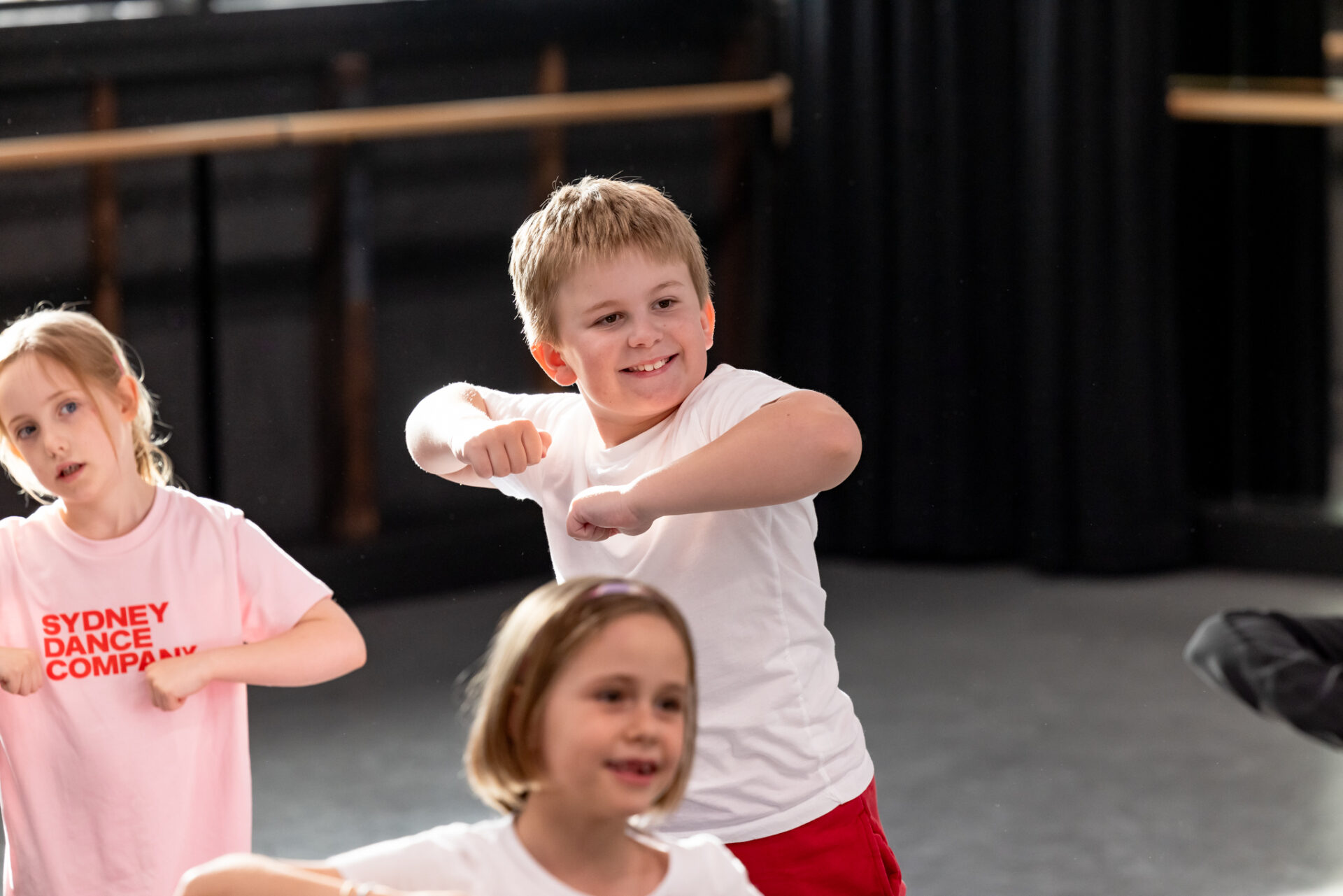 Young dancer in sunlit studios at School Holiday Workshops.